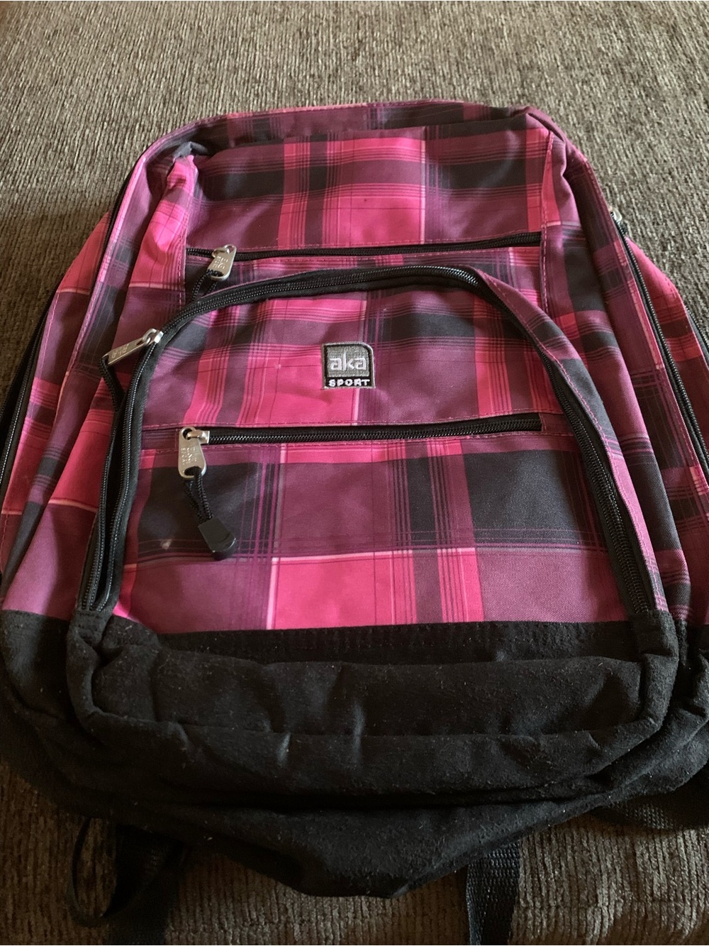 AKA Sport pink and black plaid backpack